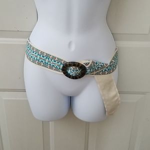 Woven colorful boho tortoiseshell o-ring belt.